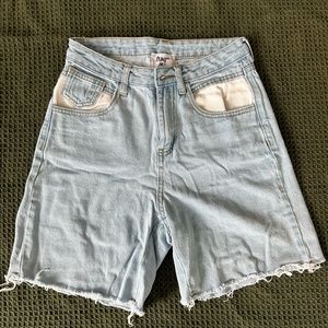 Princess Polly light wash denim shorts